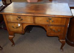 Walnut dressing table cross banded top over two drawers with further shorter drawers below and