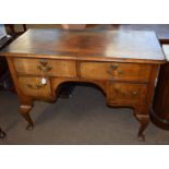 Walnut dressing table cross banded top over two drawers with further shorter drawers below and