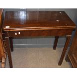 Mahogany card table of rectangular form with folding and swivelling top 83cm wide