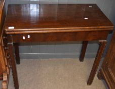 Mahogany card table of rectangular form with folding and swivelling top 83cm wide