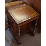 19th century rosewood Davenport with brown tooled leather insert fitted with four drawers with