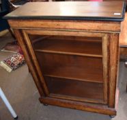 Victorian walnut peer cabinet with ebonised and parcel gilded detail glazed front and closed and