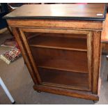 Victorian walnut peer cabinet with ebonised and parcel gilded detail glazed front and closed and