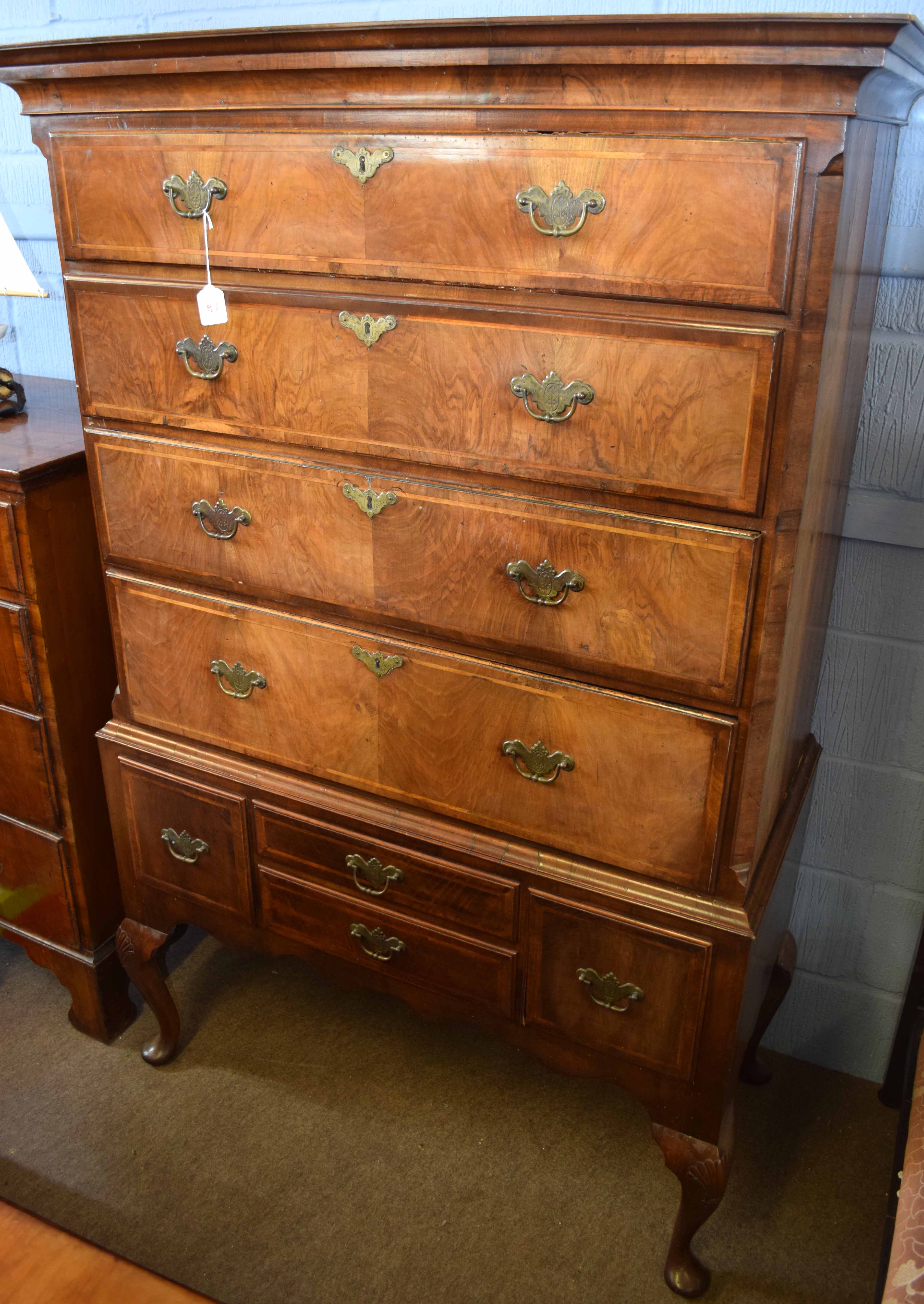 18th century and later walnut chest on stand, the upper section with four cross banded and hatched