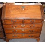 George III mahogany bureau, fitted interior and five drawers below on bracket feet, 1.06m wide