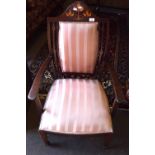 Edwardian mahogany carver chair the arch cresting rail inlaid with floral design over a pink striped