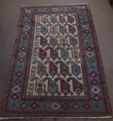 Kelim type carpet, triple gull border, central panel of geometric designs, beige, red and pale