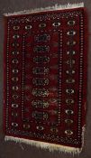 Pakara style small prayer rug with central panel of lozenges mainly rust field (worn) 95 x 65cm