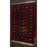 Pakara style small prayer rug with central panel of lozenges mainly rust field (worn) 95 x 65cm