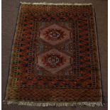 Caucasian style modern prayer rug with central panel of two lozenges within a multigul boarder