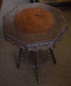 Unusual Anglo Indian style octagonal carved two tier occasional table with spreading support 49cm