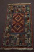 Gabbeh late 20th century rug multi coloured geometric design mainly puce field 135 x 66cm