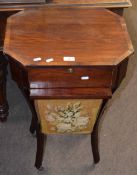 Late 19th century mahogany sewing table of octagonal form, fitted drawer over bag on swept