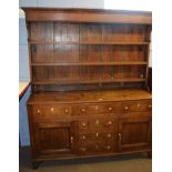 18th century and later oak dresser, plate rack back over base fitted with six drawers and two