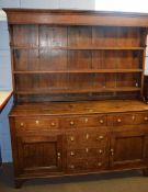 18th century and later oak dresser, plate rack back over base fitted with six drawers and two
