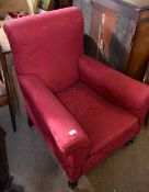 Late 19th century red upholstered easy chair on ring turned front supports