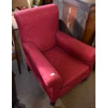 Late 19th century red upholstered easy chair on ring turned front supports