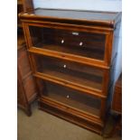 Globe-Wernicke three section glass fronted book case on plinth base 86cm wide