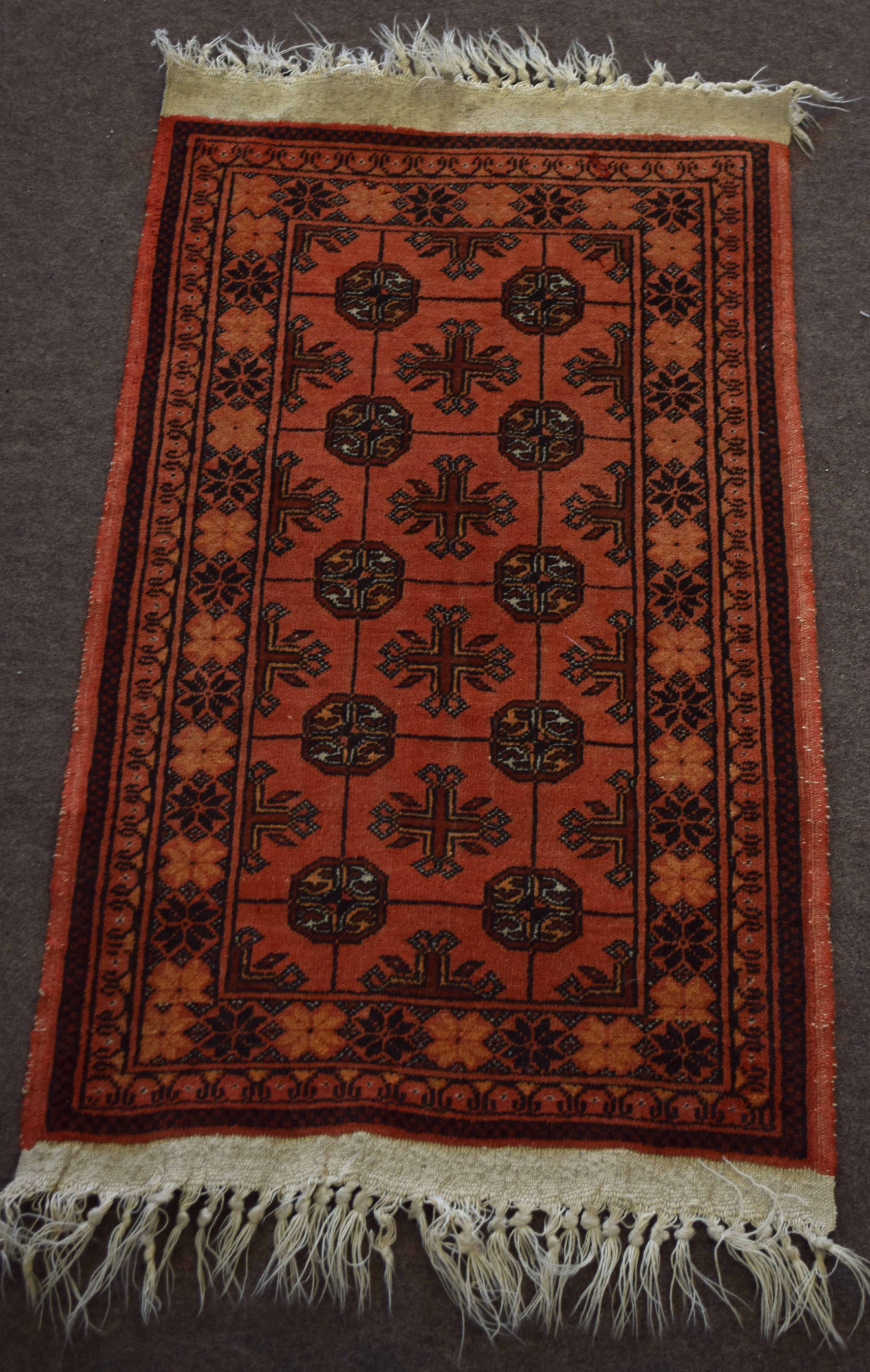 Small modern late 20th century Caucasian rug Bokhara design, rust field, 104 x 57cm