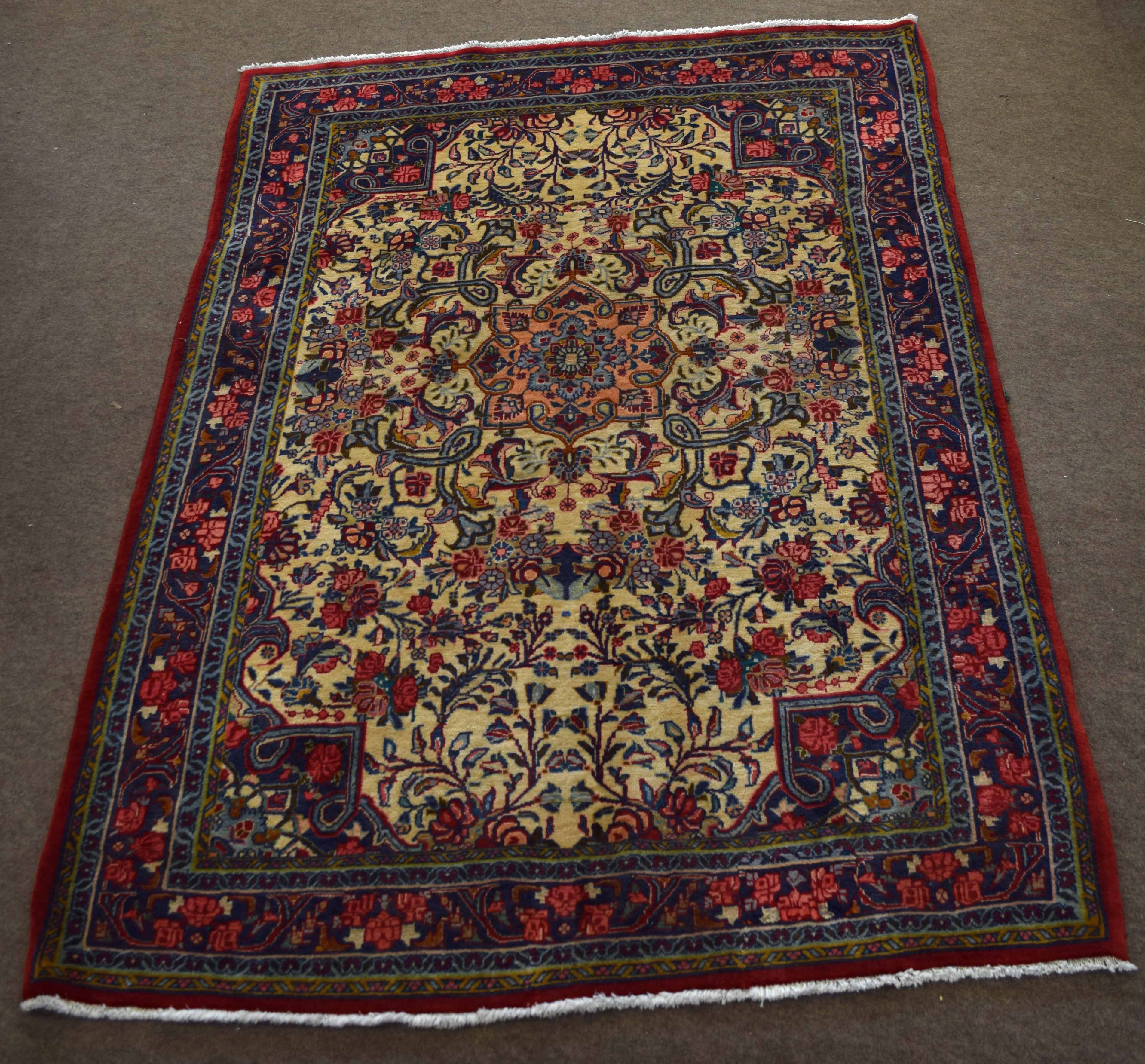 Modern caucasian rug with multi gull boarder, central panel of floral designs mainly off white and