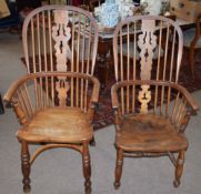 Near pair of oak Windsor style stick back solid seat armchairs |Est £70 - £90