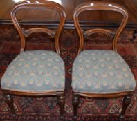 Set of six Victorian mahogany balloon back dining chairs with patterned blue upholstered seats