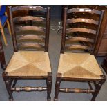 Set of six Lancashire style ladder back and rush seat oak dining chairs