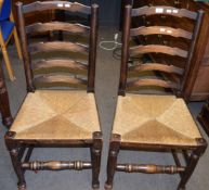 Set of six Lancashire style ladder back and rush seat oak dining chairs