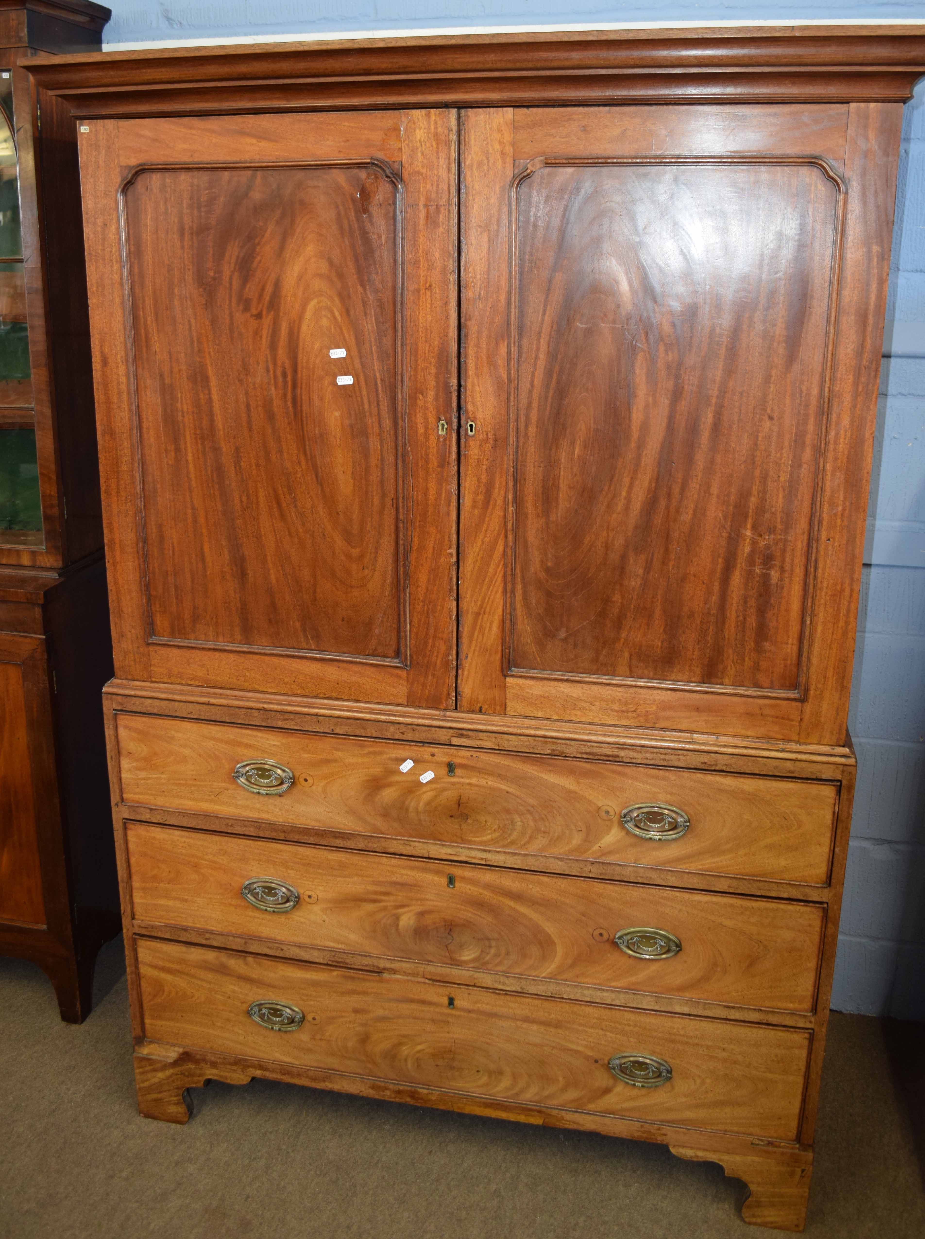 19th century mahogany converted linen press, two panel doors over three full width graduated drawers