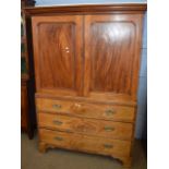 19th century mahogany converted linen press, two panel doors over three full width graduated drawers