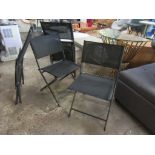 Four folding fabric chairs