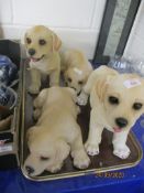 FOUR MODELS OF LABRADOR PUPPIES
