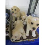 FOUR MODELS OF LABRADOR PUPPIES