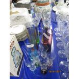 GROUP OF GLASS WARES INCLUDING FOUR CUT GLASS WINE GLASSES WITH COLOURED STEMS