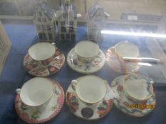 SET OF SIX ROYAL WORCESTER MINIATURE CUPS AND SAUCERS WITH THE FAN DESIGN, PINK SCALE, IMARI BOWL
