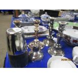 GROUP OF PLATED WARE CANDLESTICKS AND A COCKTAIL SHAKER