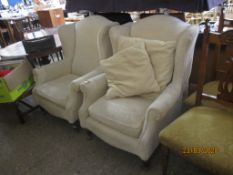 PAIR OF MODERN CREAM UPHOLSTERED WING BACK CHAIRS