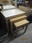 NEST OF THREE MODERN TABLES, LARGEST 55CM WIDE