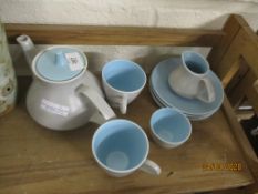 POOLE POTTERY TEA SET COMPRISING TEA POT, MILK JUG, SUGAR BOWL AND TWO CUPS AND SAUCERS IN A BLUE/