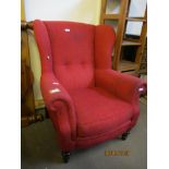 RED UPHOLSTERED WING ARMCHAIR