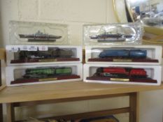 MODELS OF TRAIN ENGINES, AND TWO MODELS OF BATTLESHIPS