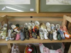 COLLECTION OF NOVELTY SHOES, MAINLY POTTERY
