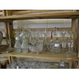 GLASS WARES INCLUDING JARS AND COVERS, CANDLESTICKS ETC