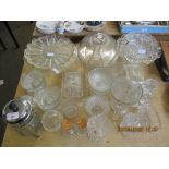 QUANTITY OF GLASS WARE INCLUDING CAKE STANDS AND COVERS, GLASS JUGS, CHEESE DISH ETC