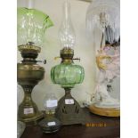 TWO METAL OIL LAMPS