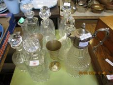 GROUP OF CUT GLASS DECANTERS AND PLATED CLARET JUG INCLUDING SHIPS DECANTER AND TWO PLATED GOBLETS