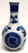 Late 18th/early 19th century Chinese porcelain bottle vase decorated in underglaze blue with a