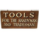 Vintage white painted on wood sign "Tools for the Handyman and Tradesmen", 45.5cm long