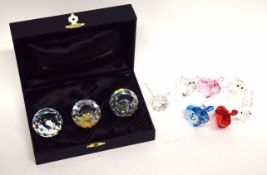 Group of Swarovski animals including a squirrel and a mouse, models of cows in various colours and