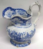 Large 19th century Don Pottery blue and white jug decorated with a landscape scene amongst flower